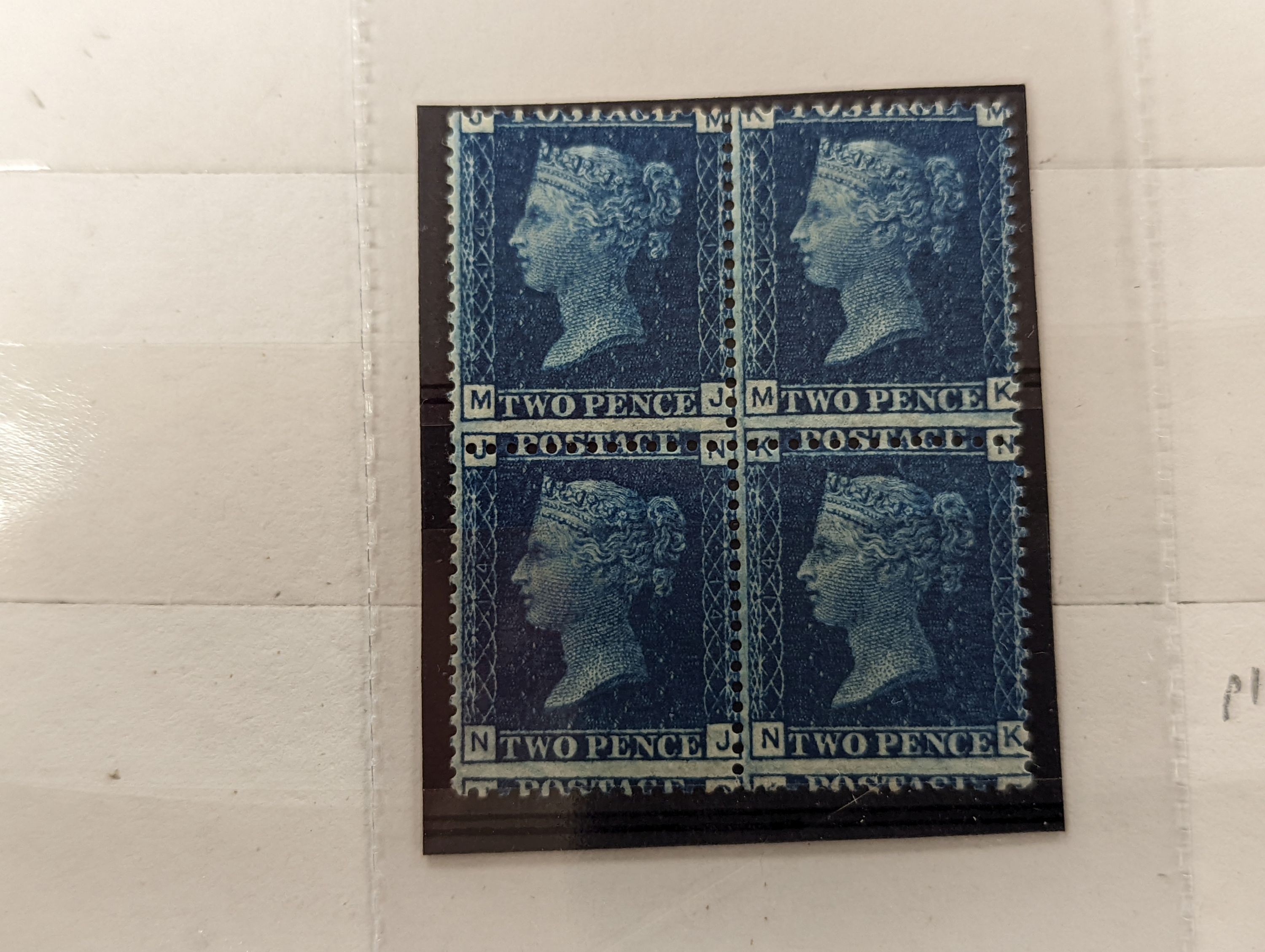Great Britain - small stock book 2d blues with 1841 2d used strip of three, 6 singles used. 1858 2d plate 13 and plate 14 mint blocks of four